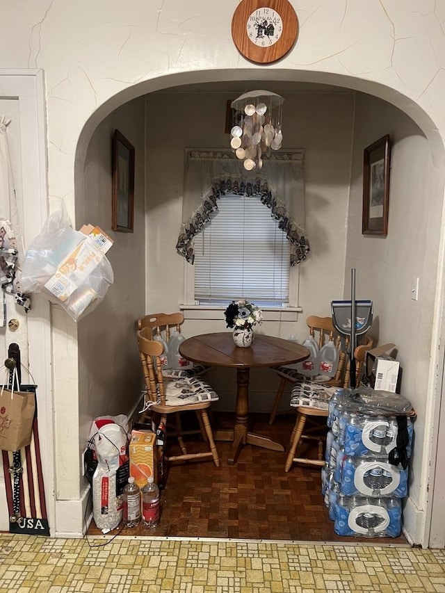316 E Jefferson St, Freeport, IL 61032 - dining room with a chandelier and arched walkways
