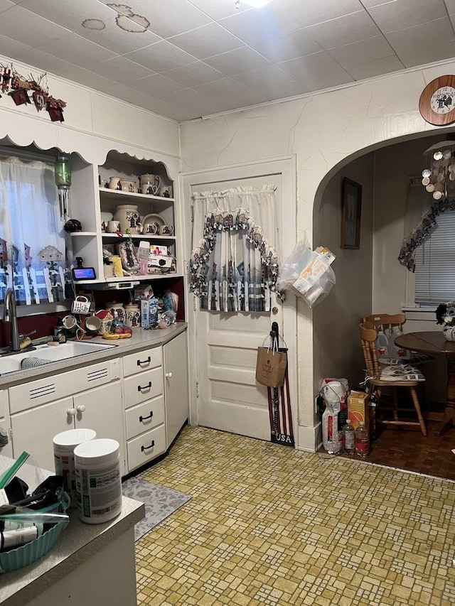 316 E Jefferson St, Freeport, IL 61032 - spacious closet featuring a sink and arched walkways