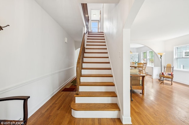 624 N Lombard Ave, Oak Park, IL 60302 - stairway with arched walkways and wood finished floors