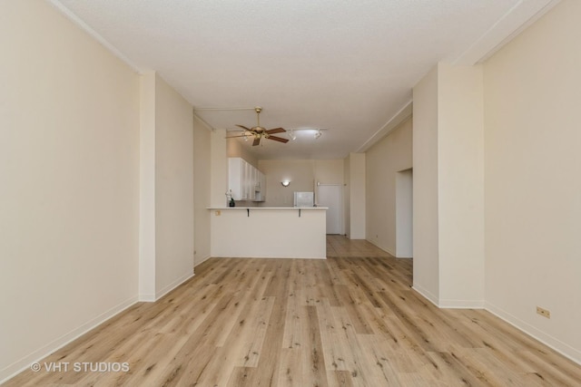 600 S Dearborn St Unit 1708, Chicago, IL 60605 - unfurnished living room featuring a ceiling fan and light wood-type flooring
