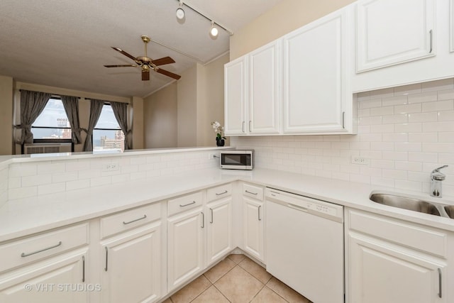 600 S Dearborn St Unit 1708, Chicago, IL 60605 - kitchen with dishwasher, ceiling fan, tasteful backsplash, and stainless steel microwave