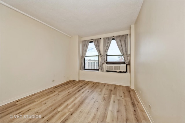 600 S Dearborn St Unit 1708, Chicago, IL 60605 - unfurnished room with wood finished floors and cooling unit