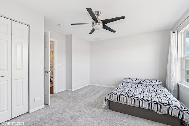 10596 W 154th Pl, Orland Park, IL 60462 - carpeted bedroom featuring baseboards, a closet, and ceiling fan