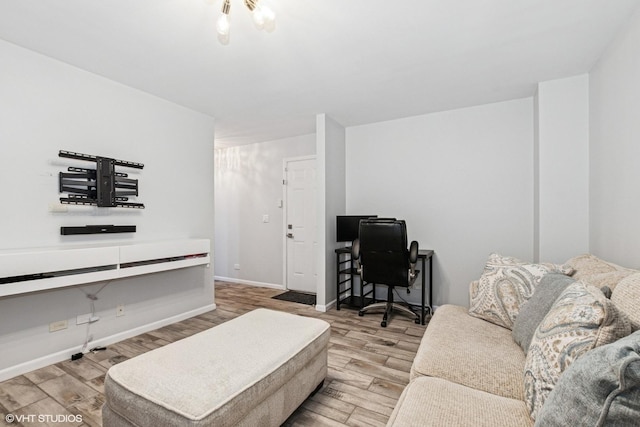 10596 W 154th Pl, Orland Park, IL 60462 - living room featuring wood finished floors, baseboards, and a desk