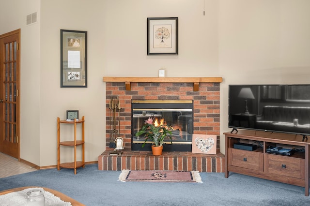 10 Primrose Ln, Sycamore, IL 60178 - carpeted living area featuring a brick fireplace