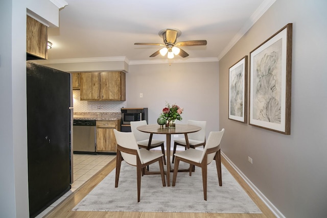 9960 Franchesca Ct Unit 3D, Orland Park, IL 60462 - dining room featuring a ceiling fan, light wood-type flooring, ornamental molding, and baseboards
