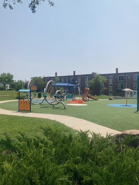 129 Elk Trl W Unit 329, Carol Stream, IL 60188 - communal playground featuring a yard