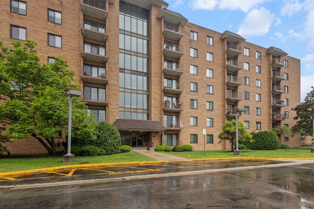 1717 W Crystal Ln Unit 310, Mount Prospect, IL 60056 - view of apartment building / complex with uncovered parking