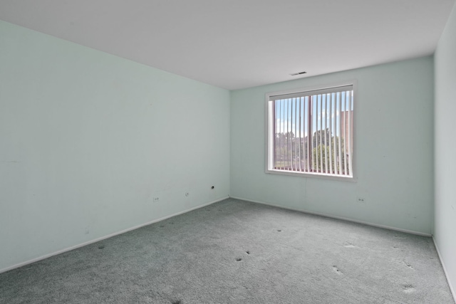 1717 W Crystal Ln Unit 310, Mount Prospect, IL 60056 - unfurnished room with carpet floors and baseboards