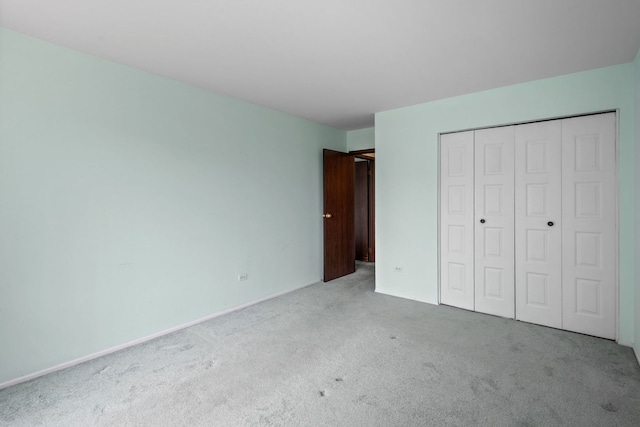 1717 W Crystal Ln Unit 310, Mount Prospect, IL 60056 - unfurnished bedroom with carpet and a closet