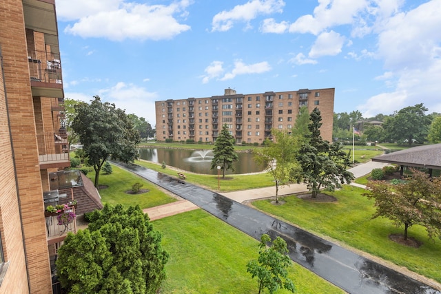1717 W Crystal Ln Unit 310, Mount Prospect, IL 60056 - view of property's community featuring a water view and a yard