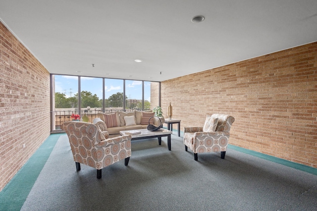 1717 W Crystal Ln Unit 310, Mount Prospect, IL 60056 - carpeted living room featuring brick wall and a wall of windows