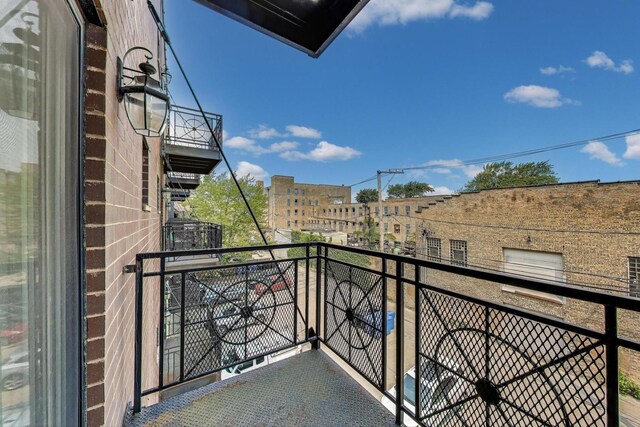 2120 W Rice St Unit 3, Chicago, IL 60622 - bedroom featuring wood finished floors, baseboards, and an office area