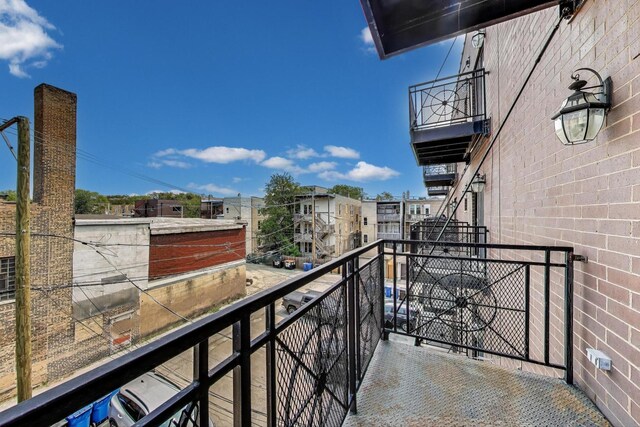2120 W Rice St Unit 3, Chicago, IL 60622 - bedroom with wood finished floors, a closet, baseboards, and an office area