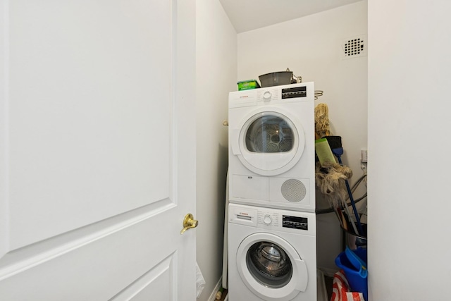 5555 N Sheridan Rd Unit 1906, Chicago, IL 60640 - laundry area with stacked washer and clothes dryer