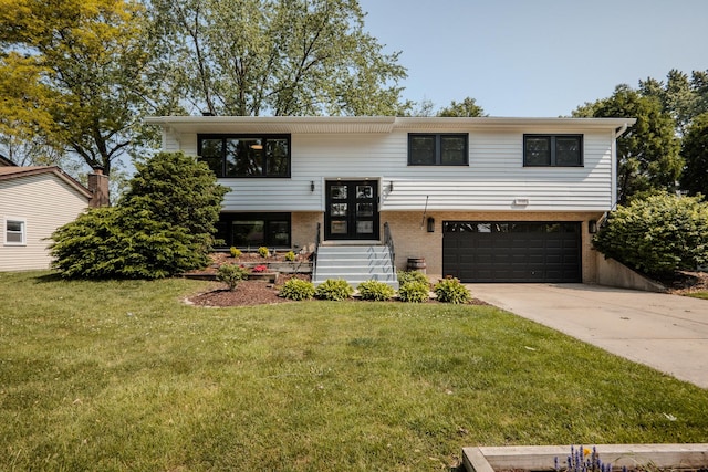 1110 71st St, Darien, IL 60561 - bi-level home with an attached garage, a front lawn, concrete driveway, and brick siding