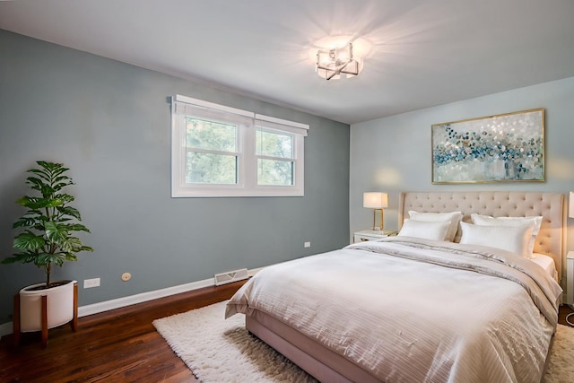1110 71st St, Darien, IL 60561 - bedroom featuring wood finished floors and baseboards