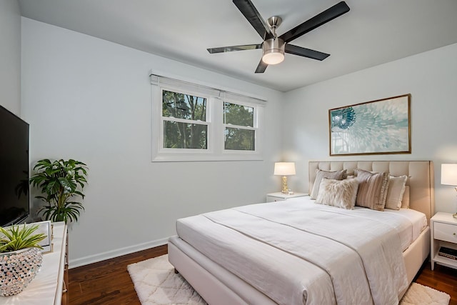 1110 71st St, Darien, IL 60561 - bedroom featuring dark wood-style flooring, baseboards, and a ceiling fan