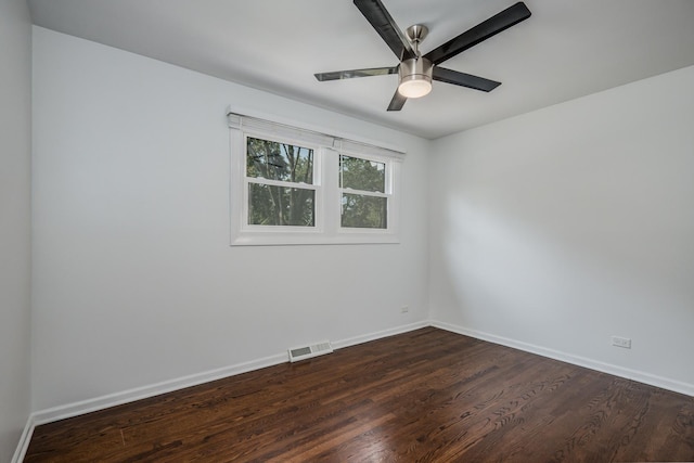 1110 71st St, Darien, IL 60561 - spare room with dark wood-style floors, baseboards, and ceiling fan