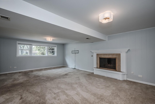 1110 71st St, Darien, IL 60561 - unfurnished living room featuring carpet flooring, a tiled fireplace, and baseboards