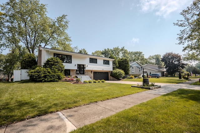 1110 71st St, Darien, IL 60561 - bi-level home with concrete driveway, a garage, brick siding, and a chimney