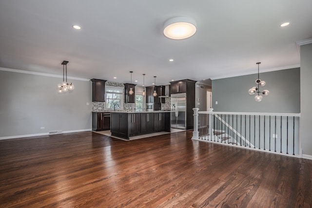 1110 71st St, Darien, IL 60561 - kitchen featuring stainless steel refrigerator with ice dispenser, a chandelier, tasteful backsplash, ornamental molding, and dark wood-style floors