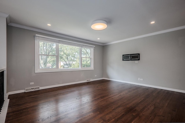 1110 71st St, Darien, IL 60561 - unfurnished living room with crown molding, dark wood-style floors, baseboards, and recessed lighting