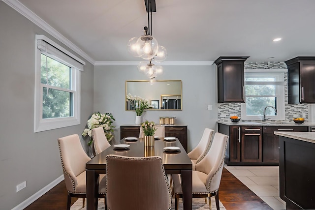 1110 71st St, Darien, IL 60561 - dining space featuring plenty of natural light, crown molding, and baseboards
