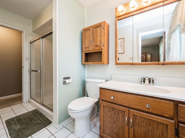 521 Harvard Ln, Hoffman Estates, IL 60169 - full bath with vanity, toilet, a shower stall, and tile patterned flooring