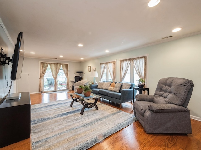 521 Harvard Ln, Hoffman Estates, IL 60169 - living area featuring recessed lighting, wood finished floors, crown molding, and baseboards