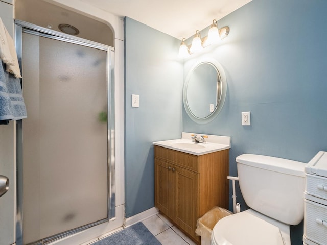 521 Harvard Ln, Hoffman Estates, IL 60169 - full bath with vanity, toilet, a shower stall, and tile patterned flooring