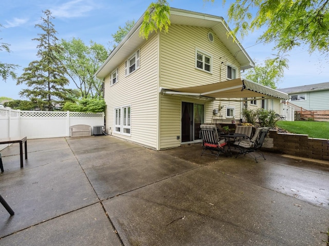 521 Harvard Ln, Hoffman Estates, IL 60169 - back of property with a patio and central AC