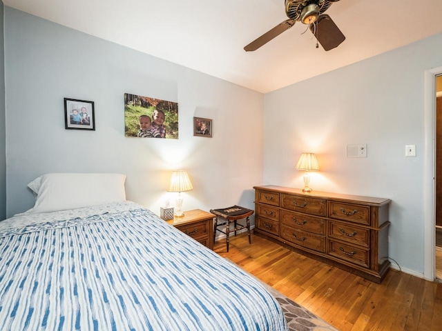 521 Harvard Ln, Hoffman Estates, IL 60169 - bedroom featuring wood finished floors, ceiling fan, and baseboards