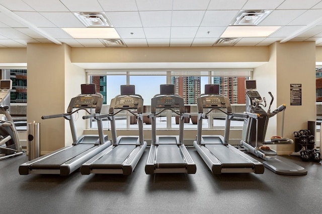 512 N Mcclurg Ct Unit 1009, Chicago, IL 60611 - gym with healthy amount of natural light and a drop ceiling