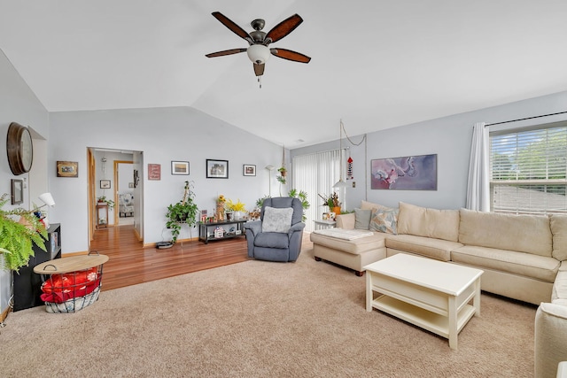 117 Andrew Taras Ct Unit B1, Joliet, IL 60435 - carpeted living area featuring lofted ceiling, plenty of natural light, ceiling fan, wood finished floors, and baseboards