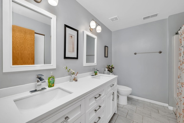 117 Andrew Taras Ct Unit B1, Joliet, IL 60435 - bathroom featuring double vanity, toilet, marble look tiles, baseboards, and a shower with shower curtain