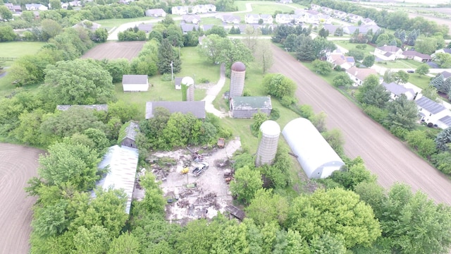 5250 Harvey Rd, Caledonia, IL 61011 - aerial view of residential area featuring a tree filled landscape