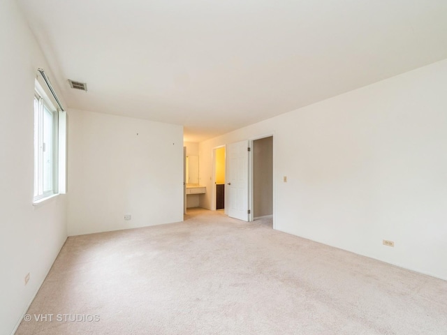127 Wolcott Ct Unit 2, Schaumburg, IL 60193 - unfurnished room featuring light colored carpet