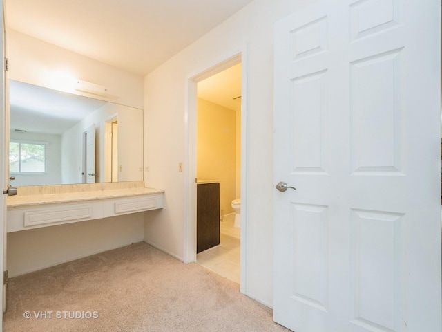 127 Wolcott Ct Unit 2, Schaumburg, IL 60193 - bathroom with toilet, vanity, and carpet floors