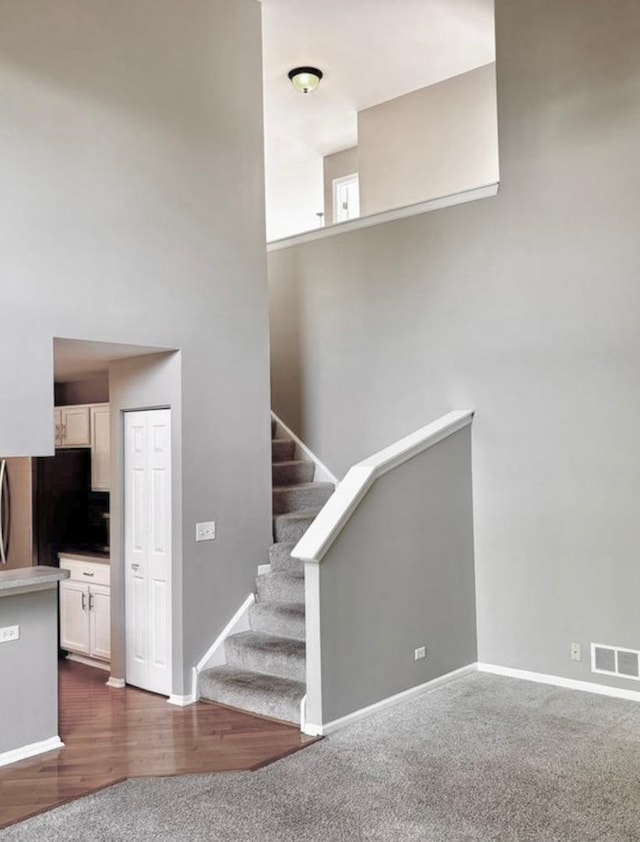 34165 N Goldenrod Rd, Round Lake, IL 60073 - staircase featuring baseboards and wood finished floors