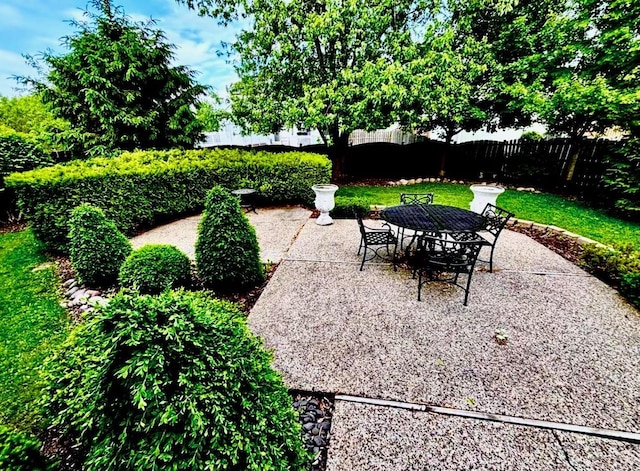 34165 N Goldenrod Rd, Round Lake, IL 60073 - fenced backyard with a patio area and outdoor dining area