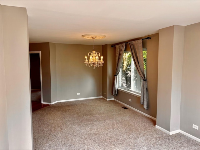 34165 N Goldenrod Rd, Round Lake, IL 60073 - spare room featuring carpet floors, a chandelier, and baseboards