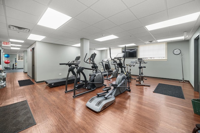 201 Reber St Unit 6, Wheaton, IL 60187 - workout area featuring wood finished floors and a paneled ceiling