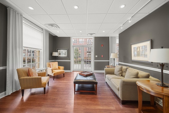 201 Reber St Unit 6, Wheaton, IL 60187 - living room with rail lighting, wood finished floors, french doors, and recessed lighting