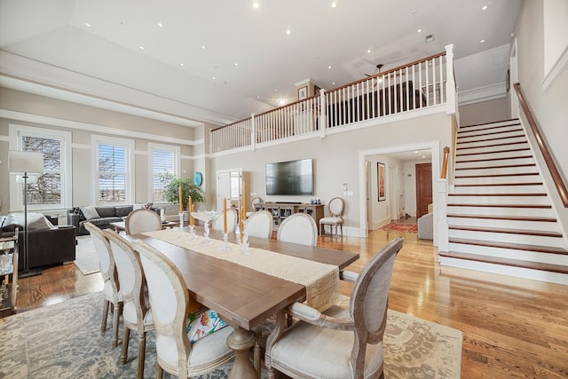 201 Reber St Unit 6, Wheaton, IL 60187 - dining room with light wood-style flooring, stairway, recessed lighting, and a high ceiling