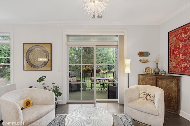 50 W Kennedy Ln Unit 102, Hinsdale, IL 60521 - living area with ornamental molding, a chandelier, plenty of natural light, baseboards, and wood finished floors