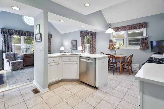 674 Foxdale Ave, Winnetka, IL 60093 - kitchen featuring dishwasher, light countertops, vaulted ceiling, white cabinets, and light tile patterned floors