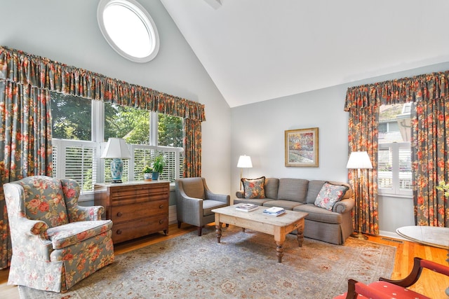 674 Foxdale Ave, Winnetka, IL 60093 - living room featuring wood finished floors and high vaulted ceiling