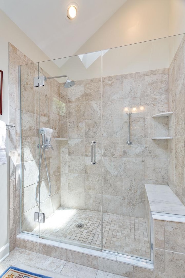 674 Foxdale Ave, Winnetka, IL 60093 - full bathroom featuring a shower stall and lofted ceiling