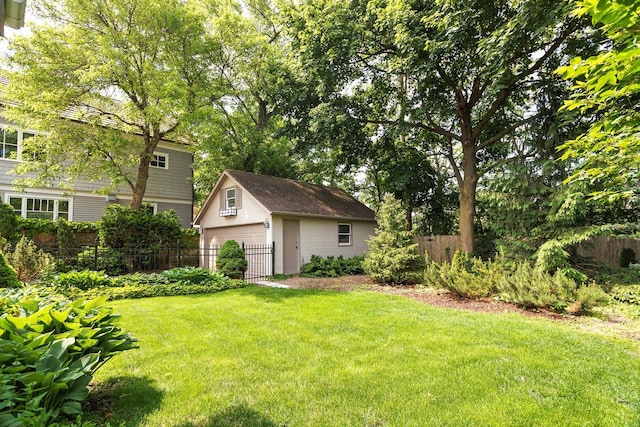 674 Foxdale Ave, Winnetka, IL 60093 - view of yard with an outbuilding and a detached garage